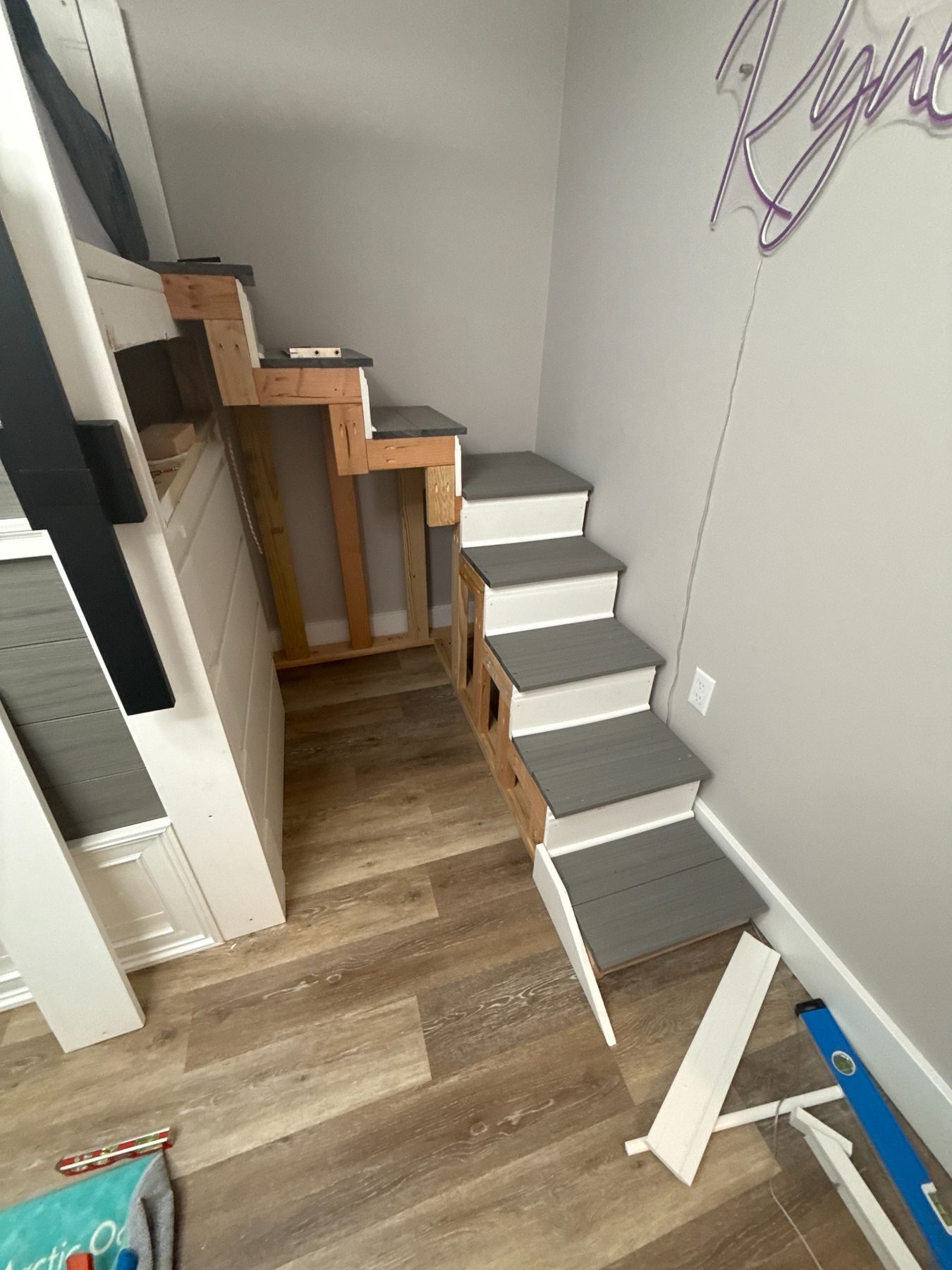 Playhouse stairs built by Dallas Manker — fitted with gray treads